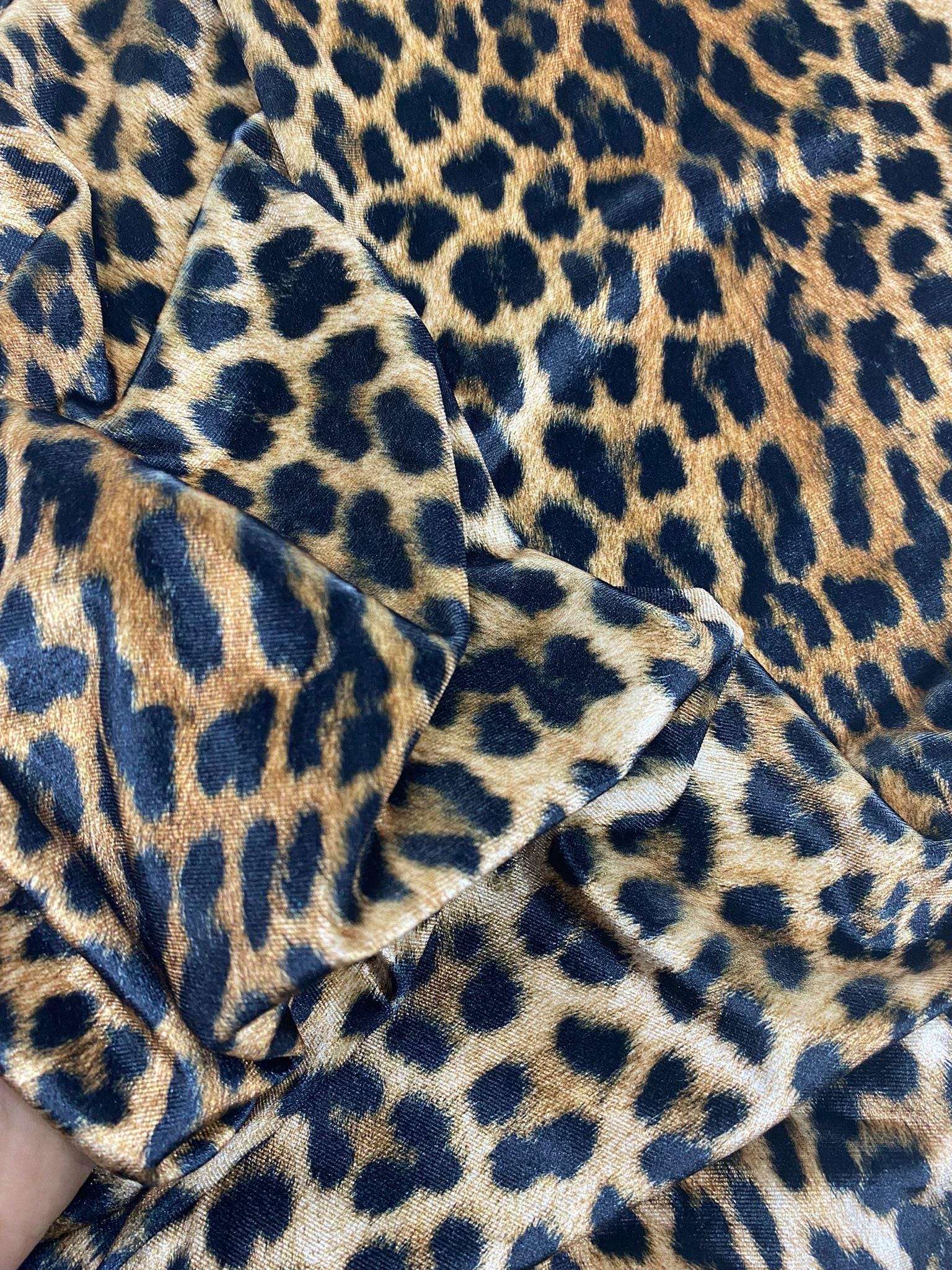 Leopard pattern stretch velvet fabric with soft, lightweight, wrinkle-free texture ideal for stylish clothing and accessories