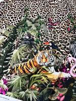 Leopard tropical leaf pattern fabric with jungle animals and leopard print background