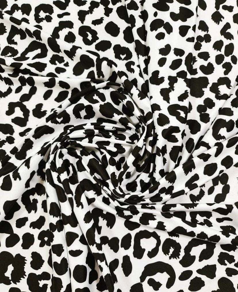 black and white leopard print fabric with stylish spots, 150cm wide, ideal for sewing projects and accessories