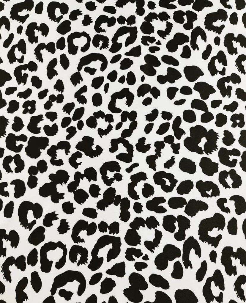 Black and white leopard print fabric pattern with irregular spots, 150cm wide, suitable for sewing projects and fashion designs