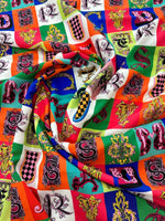 Colorful letter print cotton fabric with decorative alphabet blocks, soft and durable material for sewing and crafting projects