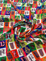 Colorful letter print cotton fabric with decorative alphabet blocks and a soft, durable texture perfect for sewing and crafting projects