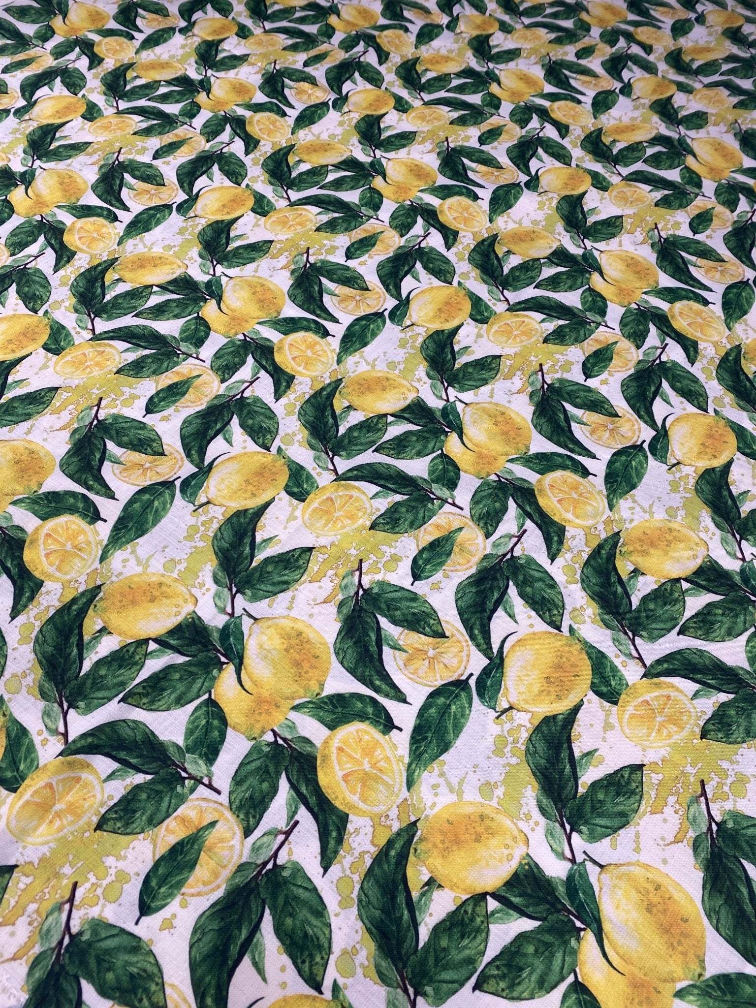Limon Design Linen Fabric with yellow lemon and green leaf pattern for home decor and fashion projects