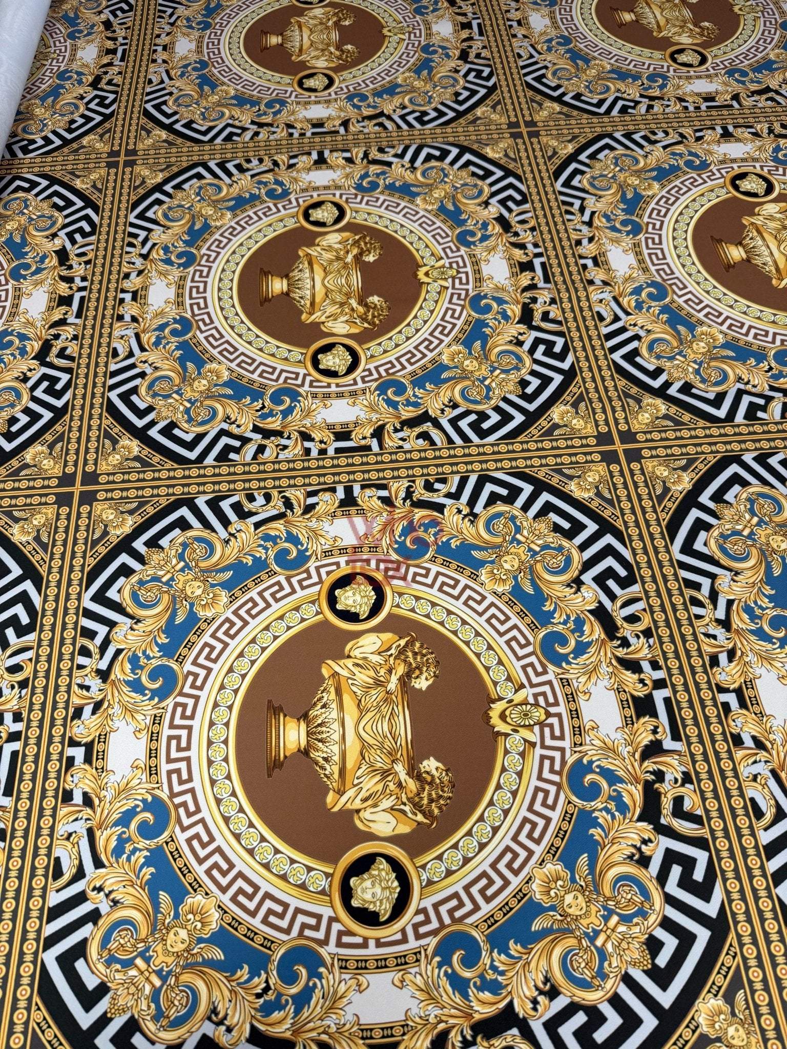 Gold and blue ornate baroque pattern luxury fabric with intricate gold urn motifs and decorative borders