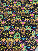 Vibrant black fabric with colorful baroque floral heart pattern and ornate gold frames