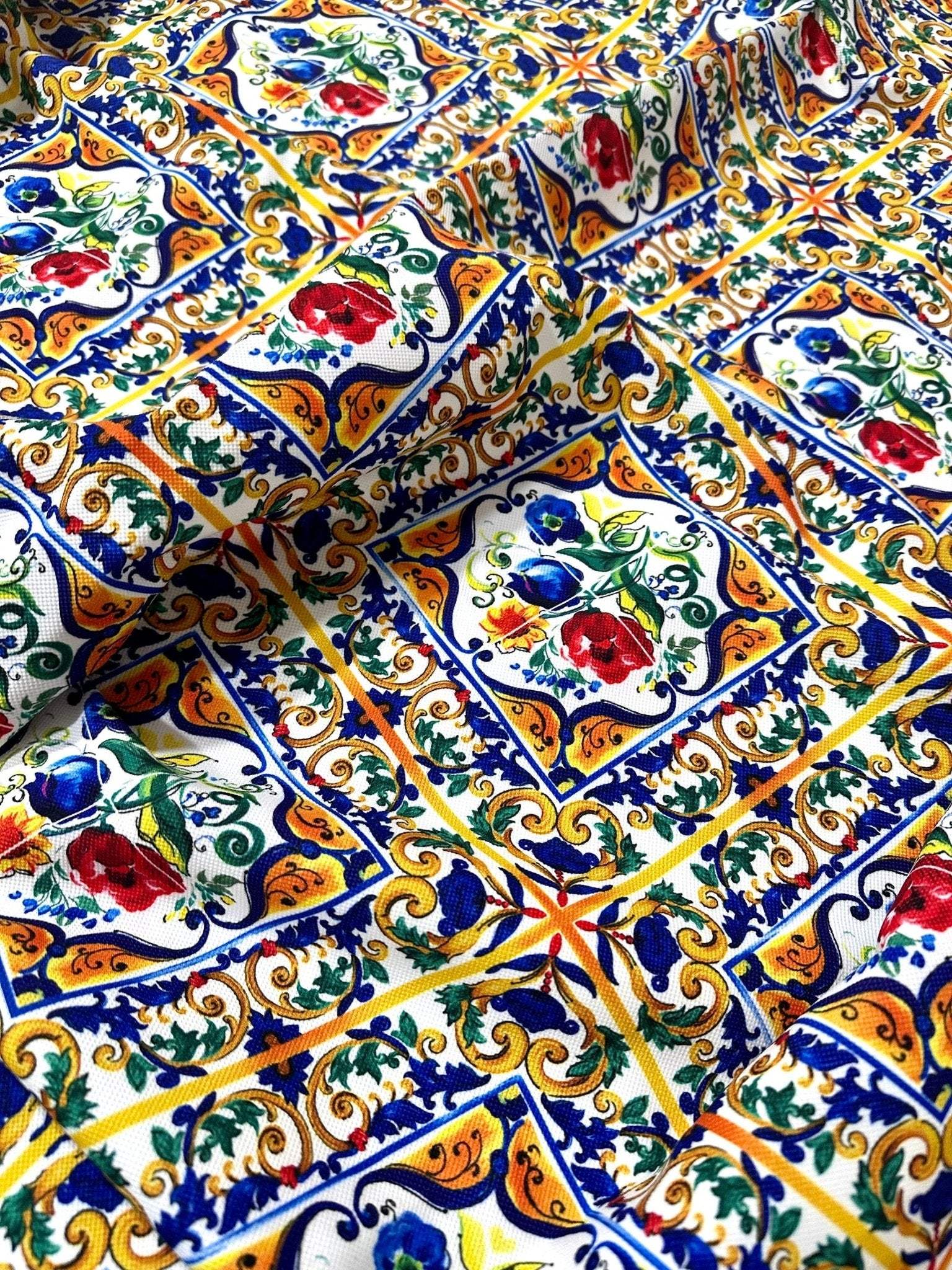 Close-up of Majolica Pattern Luxury Fabric with colorful digital print featuring intricate floral and geometric designs on durable high-quality material.