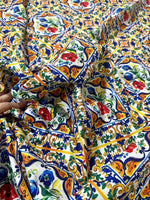 Close-up of Majolica Pattern Luxury Fabric with colorful floral and ornate tile-inspired design on durable digital print textile