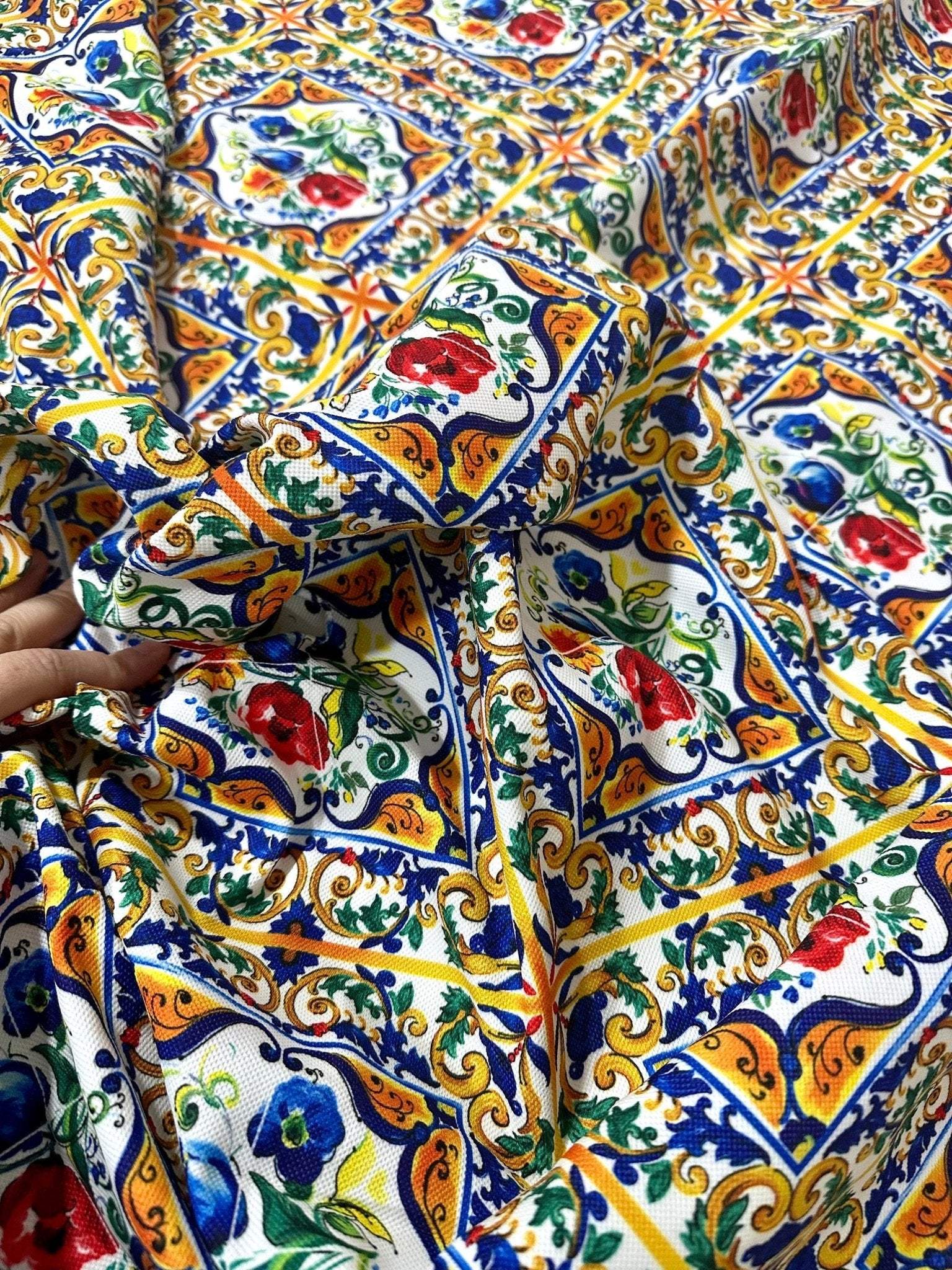 Close-up of Majolica Pattern Luxury Fabric with colorful floral and ornate tile-inspired design on durable digital print textile