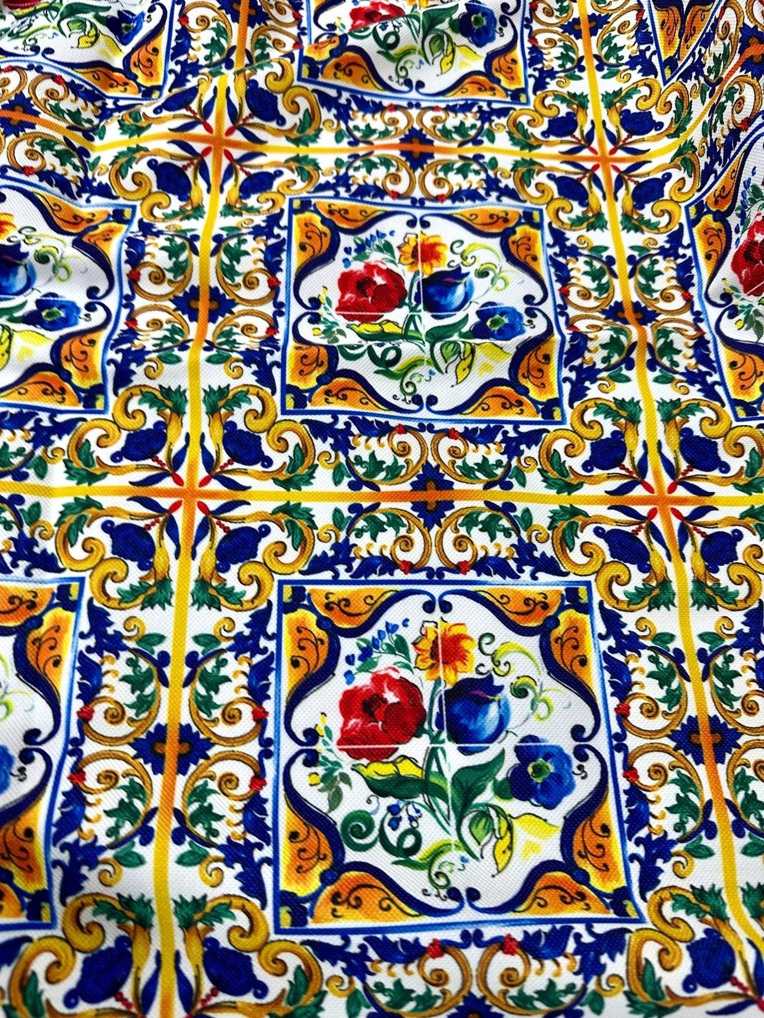 Majolica Pattern Luxury Fabric with vibrant floral and ornamental tile design in blue, yellow, red, and green colors