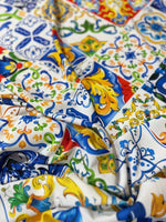 Colorful Majolica pattern fabric with intricate decorative tile designs perfect for sewing crafts and projects