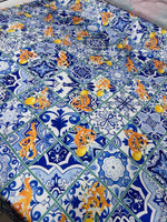 Majolica Lemons luxury fabric with traditional blue tile and vibrant lemon pattern for upholstery and decor