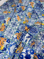 Majolica Lemons Luxury Fabric with vibrant blue and yellow lemon-themed majolica tile pattern, 150cm width, ideal for upholstery and drapery.