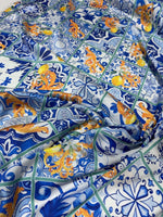 Majolica Lemons luxury fabric with vibrant lemon and traditional blue tile pattern, 150cm width textile for upholstery and drapery