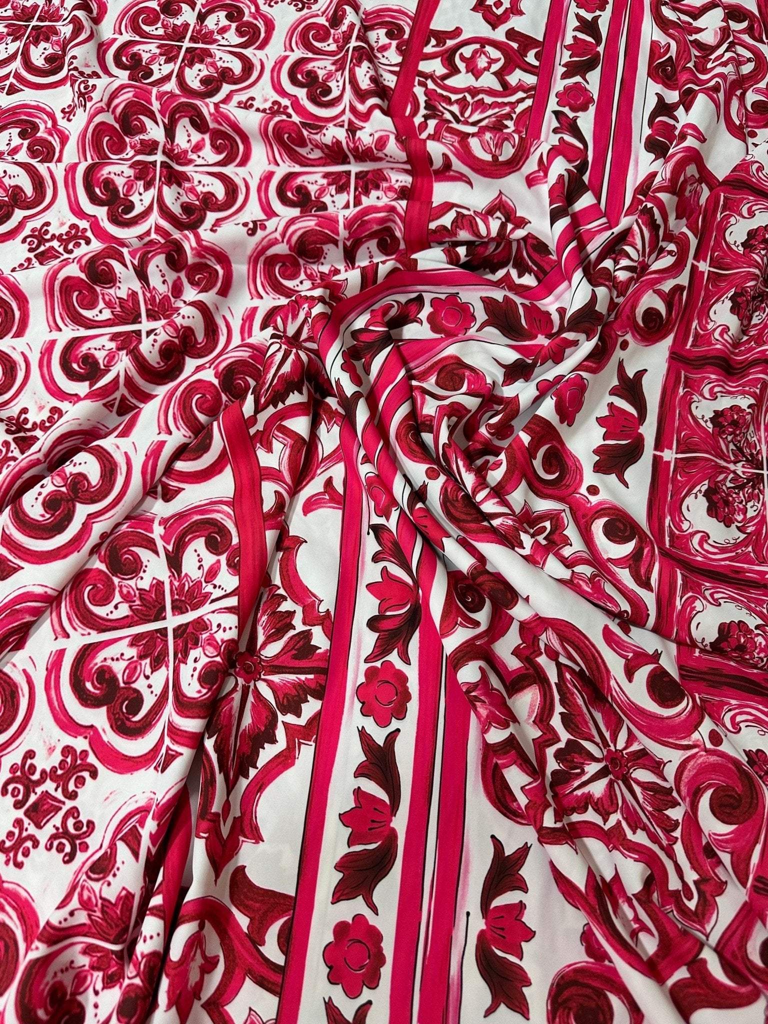 Pink Sicilian Majolica pattern fabric with intricate red and white tile-inspired design and 150cm width.
