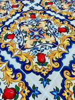 Majolica Pattern Fabric with vibrant Sicilian-inspired floral and ornamental design in blue, yellow, and red colors