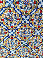 Colorful Majolica pattern fabric with intricate Sicilian floral and ornamental design on a white background