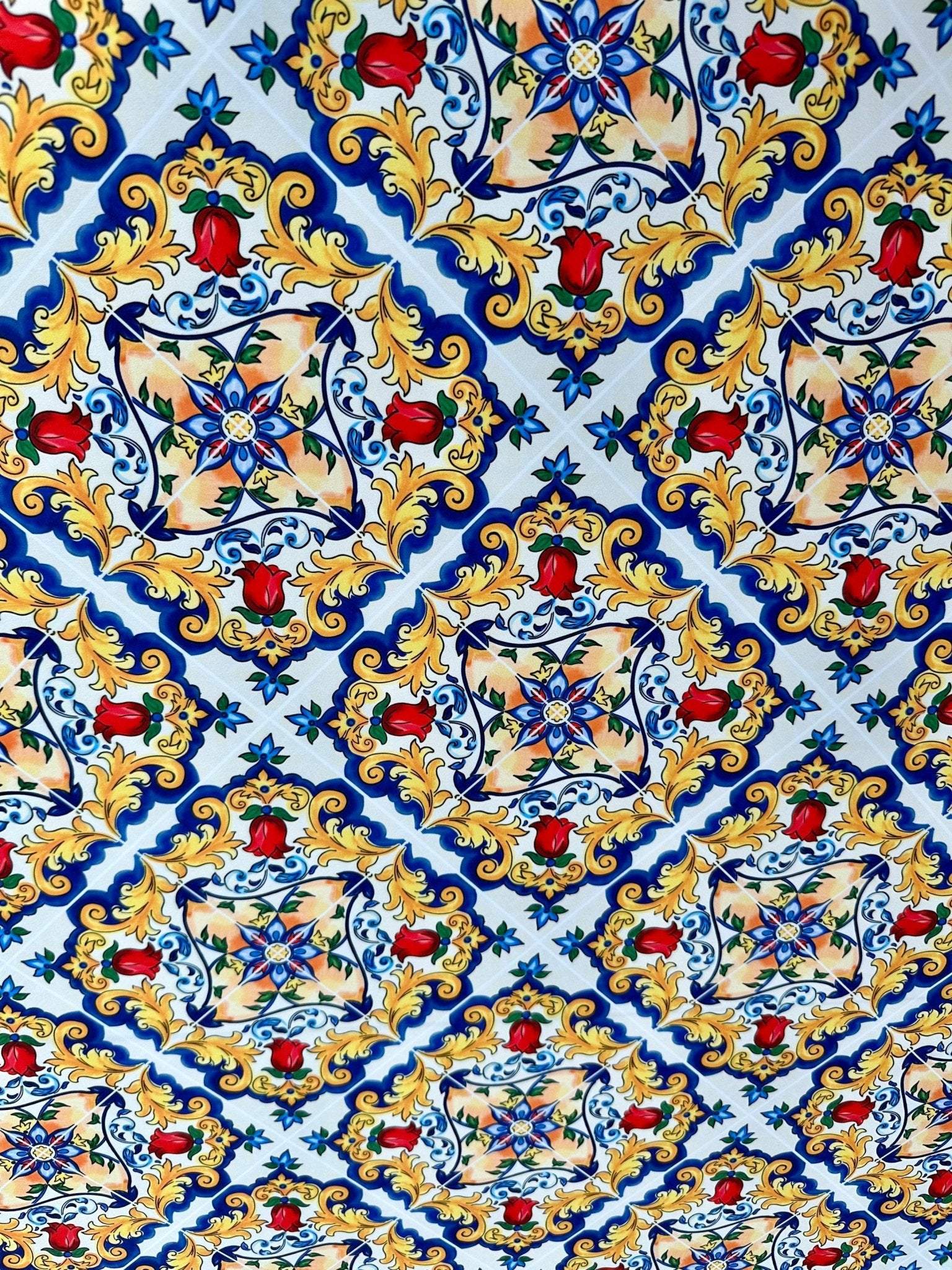Colorful Majolica pattern fabric with intricate Sicilian floral and ornamental design on a white background