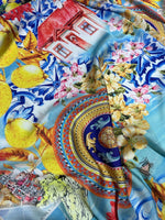 Colorful Majolica Sicilian print fabric with vibrant lemons, floral and architectural patterns on 150cm wide cloth