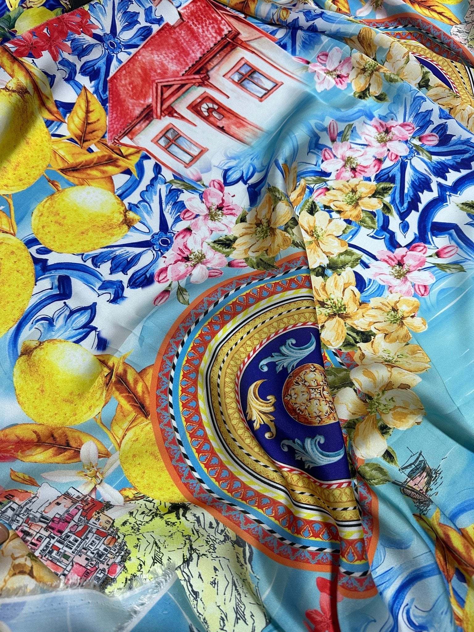 Colorful Majolica Sicilian print fabric with vibrant lemons, floral and architectural patterns on 150cm wide cloth
