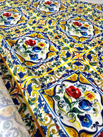 Blue and yellow floral Majolica pattern fabric with red and blue flowers and intricate decorative details