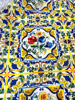 Blue and yellow floral majolica pattern fabric with intricate traditional tile-inspired design and vibrant colors