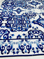 Close-up of durable Majolica pattern outdoor fabric in blue and white, weather-resistant upholstery material for outdoor furniture