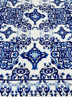 Blue and white Majolica pattern outdoor fabric with intricate detailed design, weather-resistant upholstery material