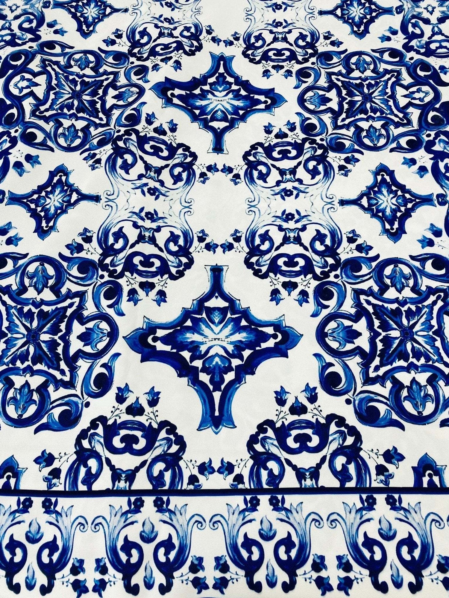 Blue and white Majolica pattern outdoor fabric with intricate detailed design, weather-resistant upholstery material
