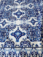 Blue and white Majolica pattern outdoor upholstery fabric with intricate weather-resistant design