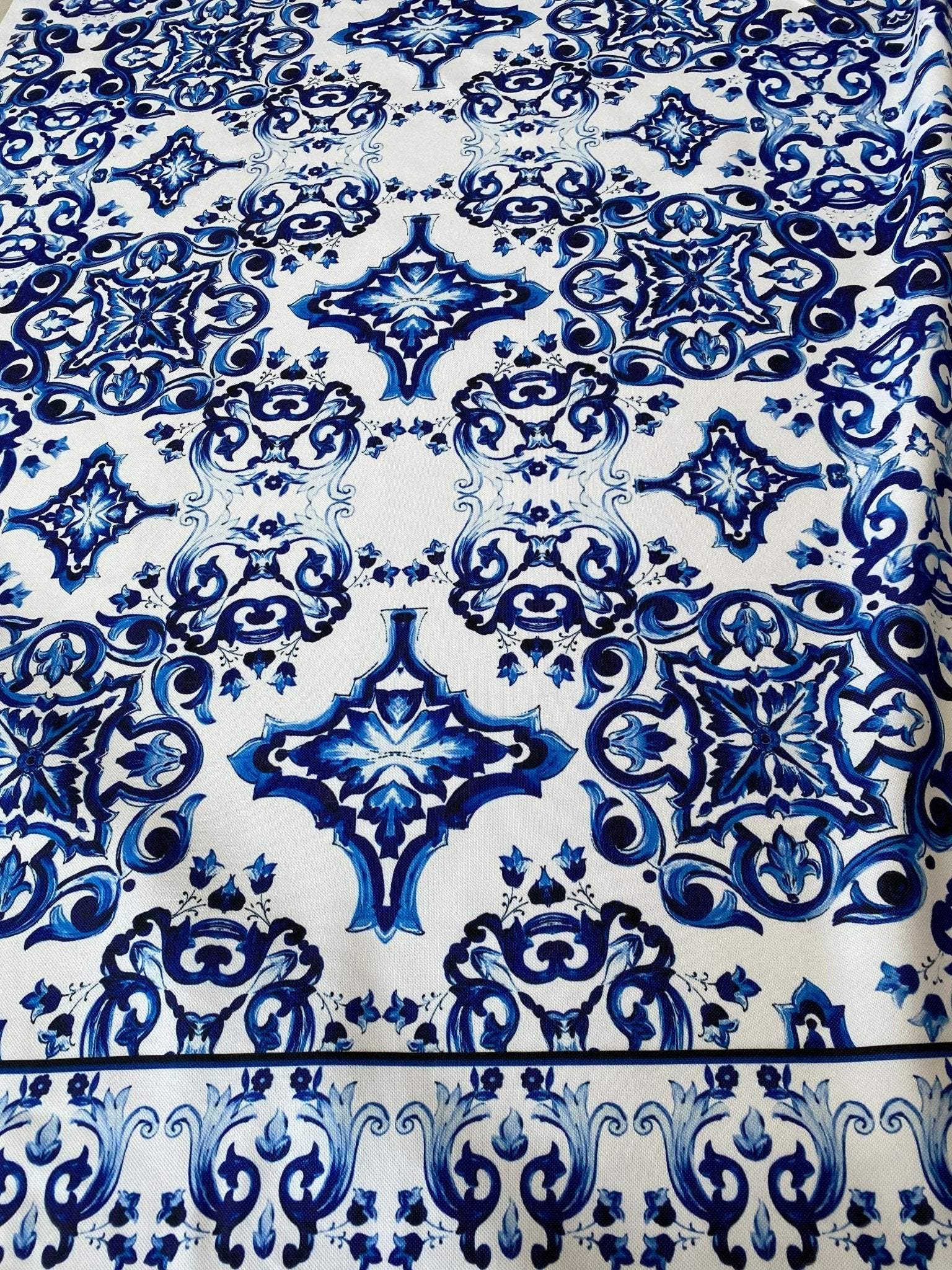 Blue and white Majolica pattern outdoor upholstery fabric with intricate weather-resistant design
