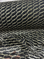 Black zigzag mesh lace fabric with intricate textured pattern for elegant fashion designs