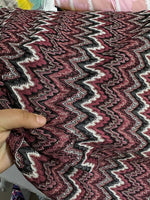 Bordeaux zigzag mesh knit jersey fabric with shiny zigzag pattern and textured knit design