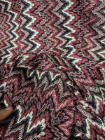 Bordeaux Zigzag Mesh knit jersey fabric with shiny zigzag pattern in burgundy, black, and white colors, 150 cm wide textile ideal for fashion projects