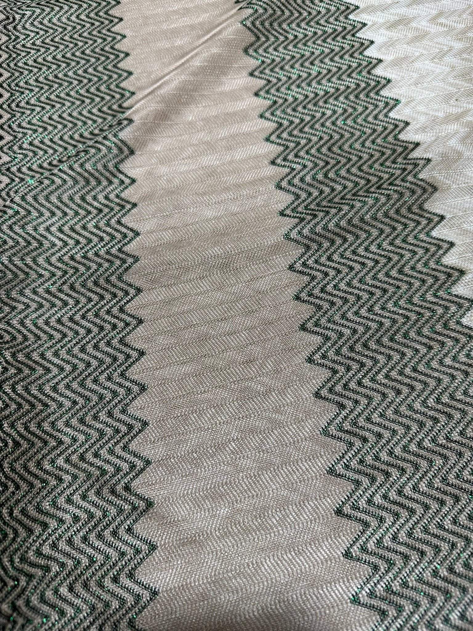 Gray zigzag knit jersey fabric with green glitter breathable mesh for stylish garments