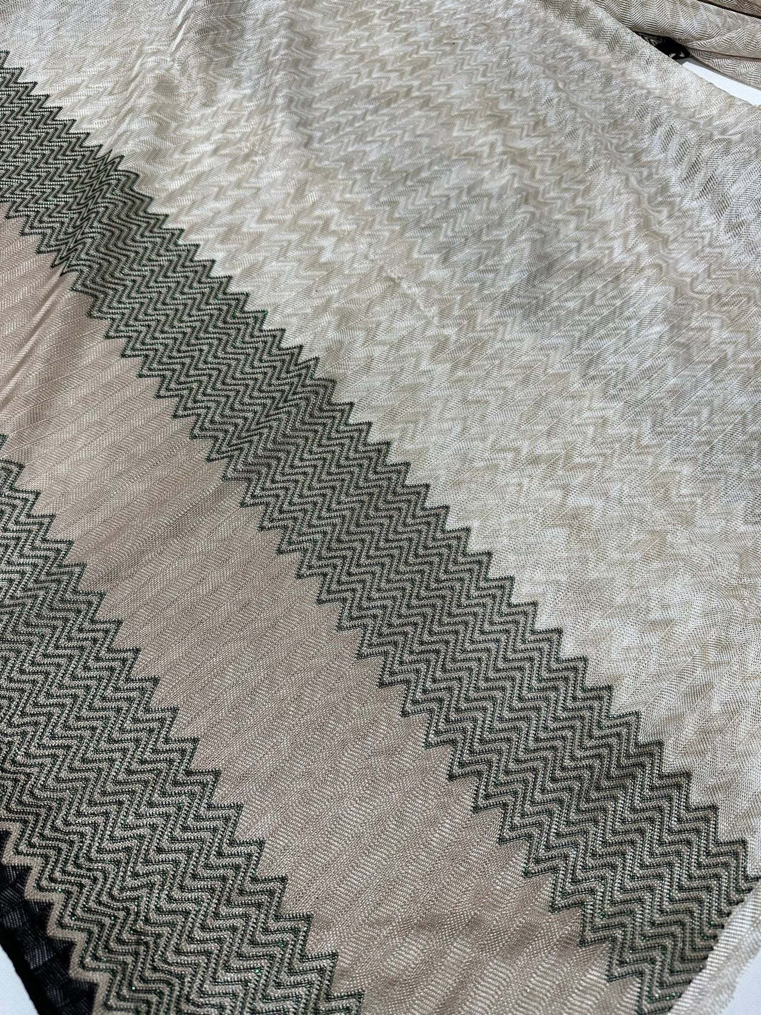 Gray zigzag knit jersey fabric with green glitter breathable mesh for stylish garment sewing projects