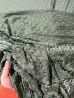 Green and Brown Zigzag Knit Jersey Mesh Fabric with textured zigzag pattern and soft drape in hand