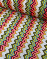 Multicolor zigzag knit jersey mesh fabric with vibrant zigzag pattern for crafting and apparel projects