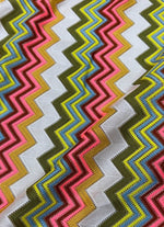Multicolor zigzag knit jersey mesh fabric with vibrant zigzag pattern for crafting and apparel projects