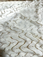 Off-White zigzag knit jersey fabric in mesh with modern pattern and breathable texture