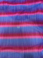 Colorful pleated power mesh fabric with shiny threads in blue and pink stripes, lightweight and textured material