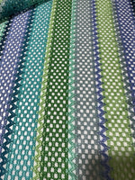 Striped knit mesh fabric with green and blue zigzag pattern for creative sewing projects