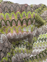 Beige green zigzag knit jersey mesh fabric with soft stretchy texture for clothing and crafts