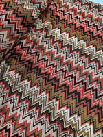 Coral zigzag knit jersey fabric with luxury mesh Italian design in coral, brown, and beige tones