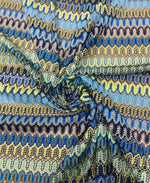 Yellow and blue zigzag pattern mesh fabric for crafting and fashion projects