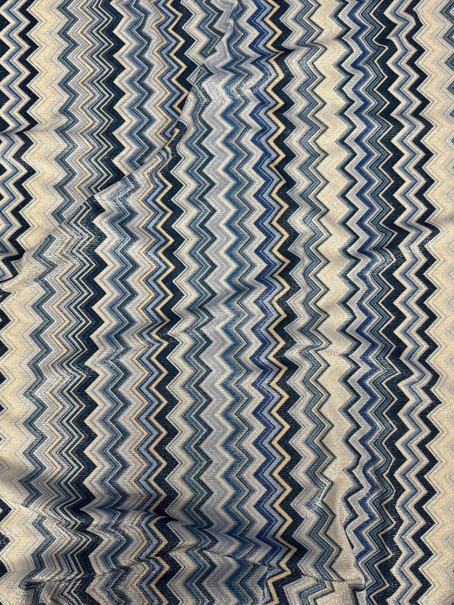 Stretch Lurex Fabric with blue and beige zigzag pattern and 4-way stretch mesh texture
