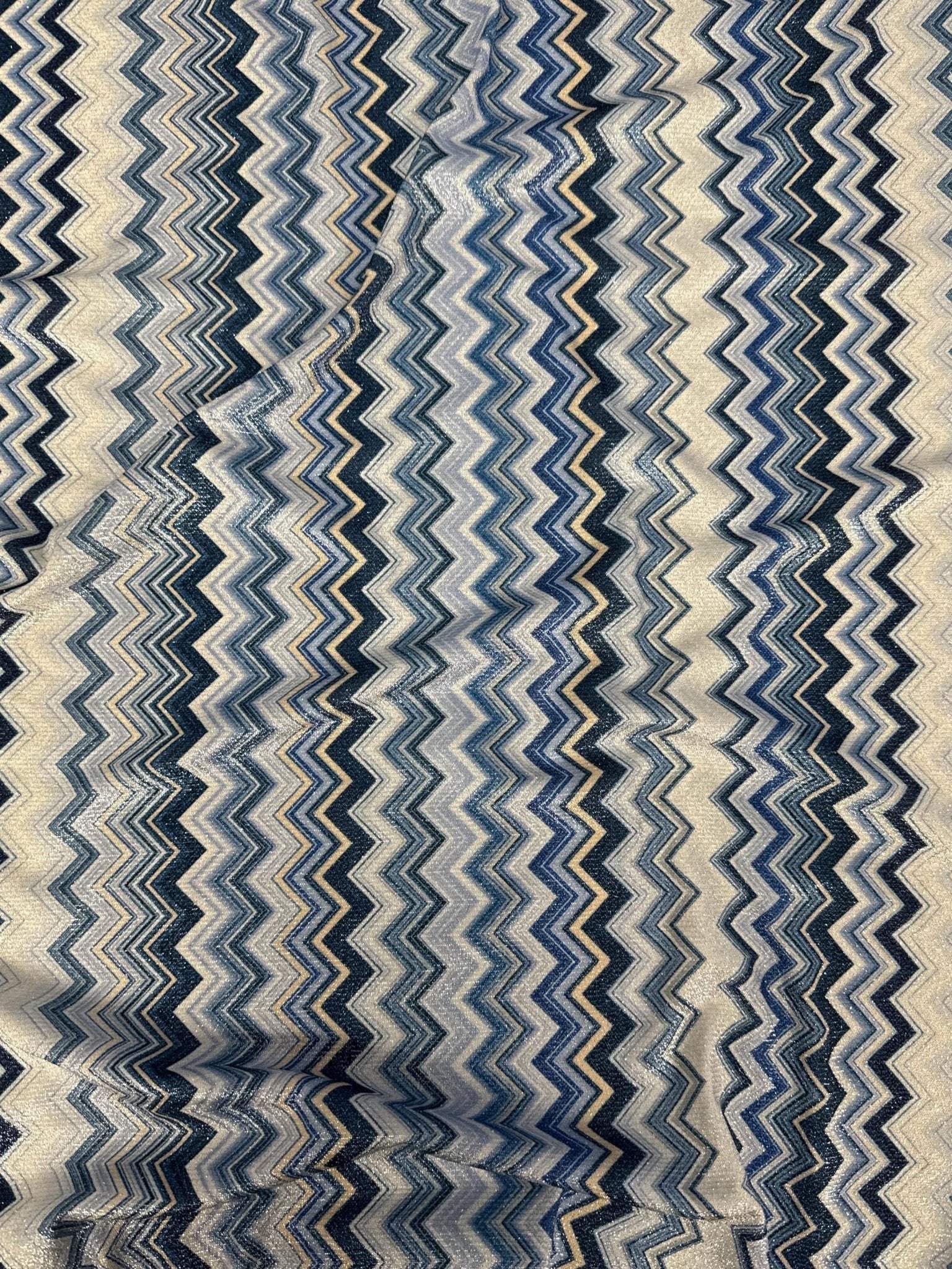 Stretch Lurex Fabric with blue and beige zigzag pattern and 4-way stretch mesh texture