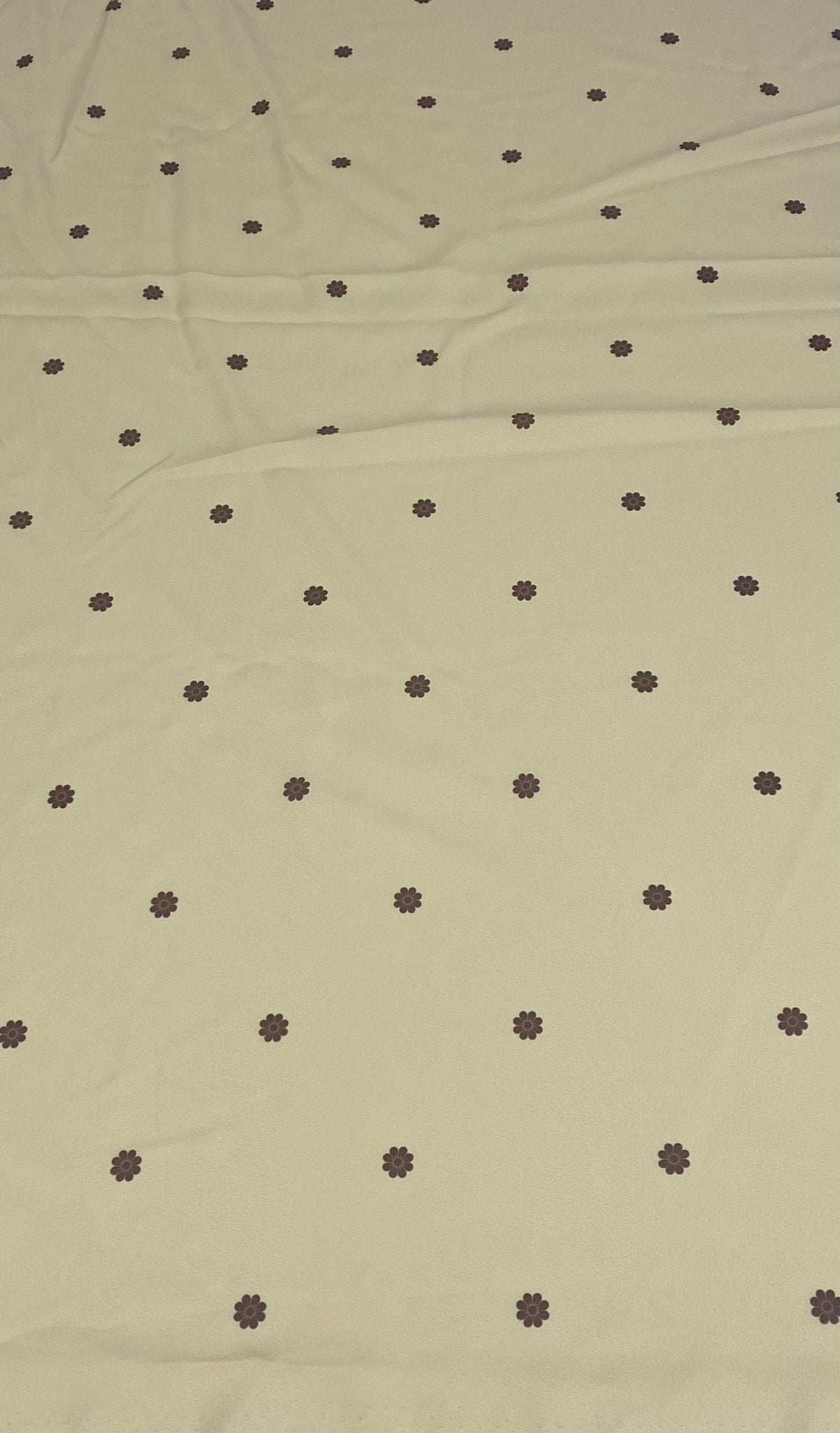 Minimal yellow fabric with small brown floral pattern and soft texture, 150cm width