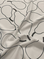 Minimalist pear print fabric with black outlined pears on a light background, soft and durable material for sewing and home decor projects