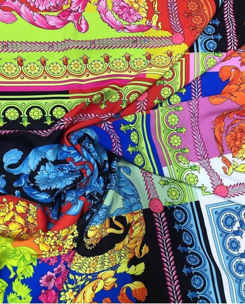 Vibrant multi-color Baroque pattern fabric with intricate floral and ornamental designs, ideal for sewing and crafting.