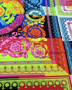 Vibrant multi-color Baroque pattern fabric with intricate floral and scroll designs, perfect for sewing projects